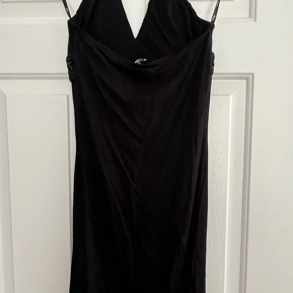Sky dress available in 3 sizes. Decorative neckline. 93% Rayon & 7% Spandex. - Picture 6 of 7